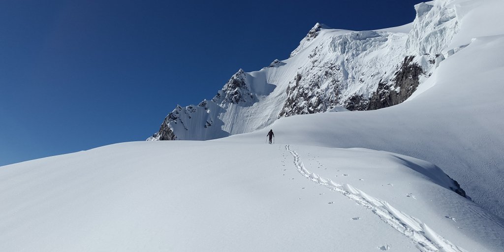 man-climbing-up-in-snow-100