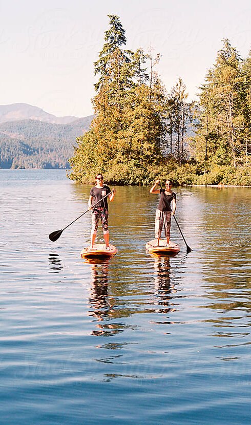 2278405 Two people on paddle boards